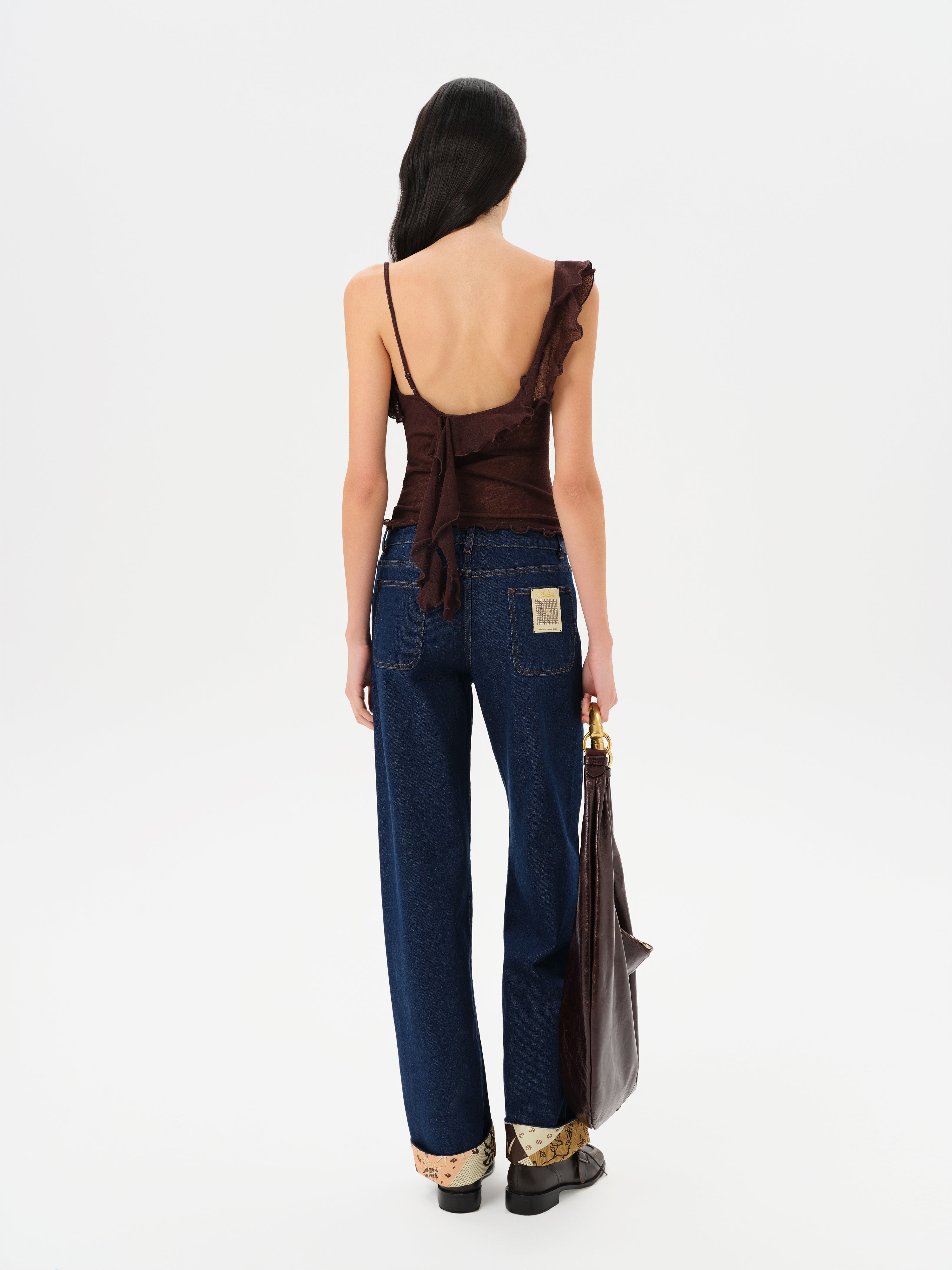 ARLA - Sheer mesh top with ruffle detail