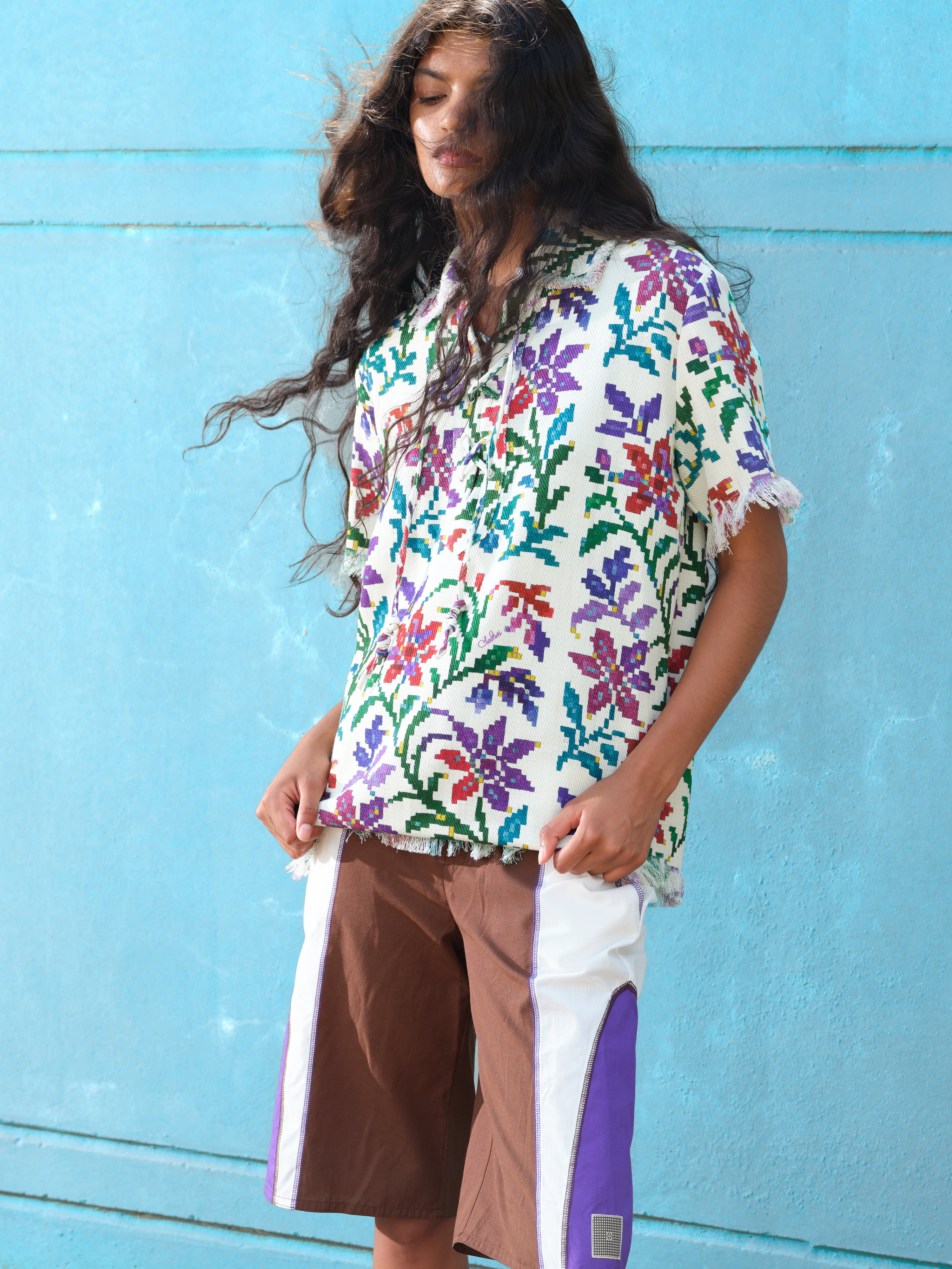 CARLOS - Lace-up polo shirt with frindged raw edges