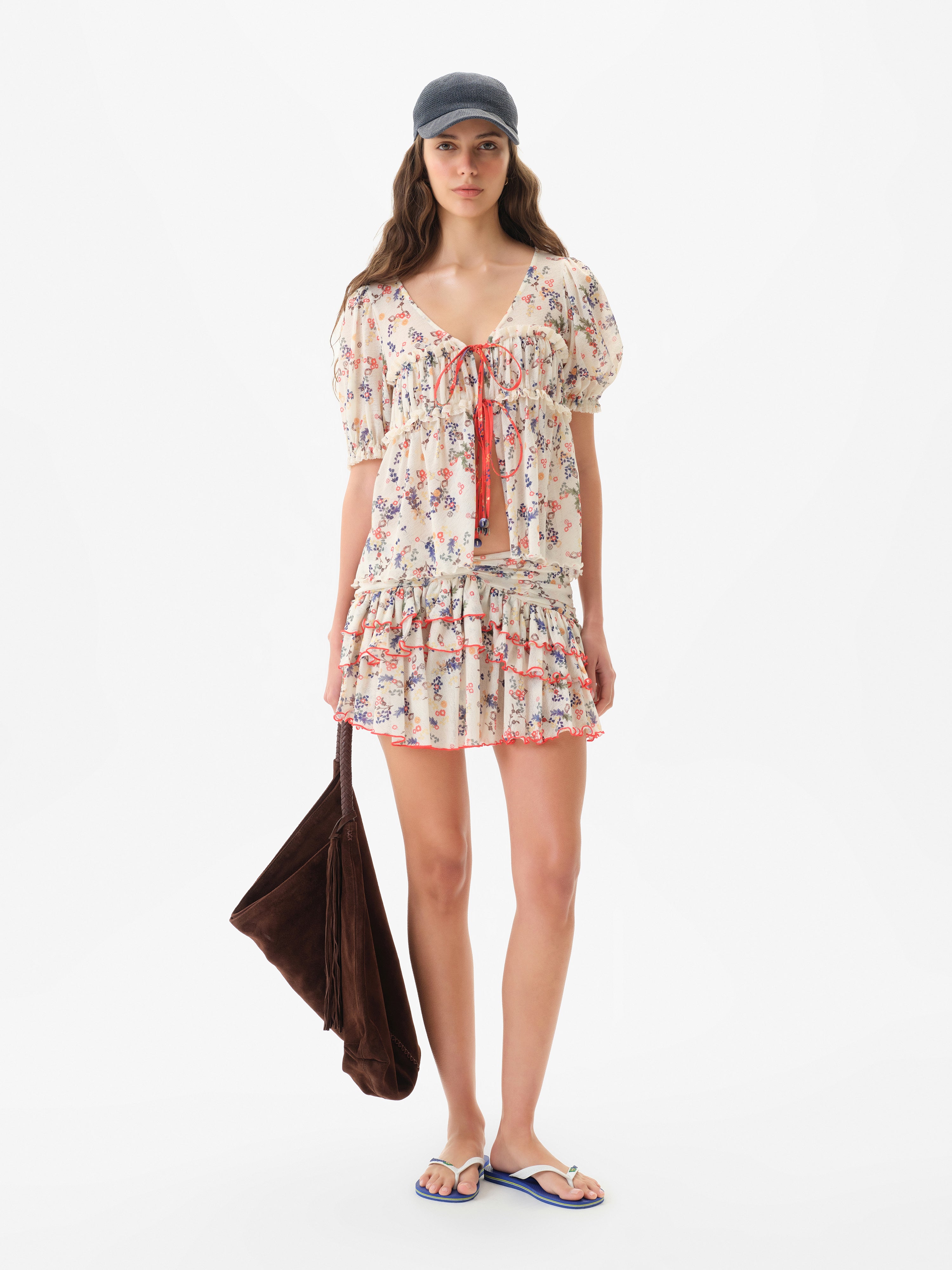 KAIA - Flower print semi-sheer mesh mini skirt with ruffles