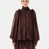 SERENA - Printed sheer long-sleeve blouse with open-back design