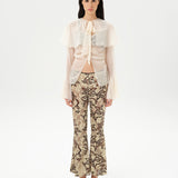 STELLA - Sheer chiffon long-sleeve blouse with  deep V-neck design