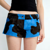 ILOA - Cow-print pony hair leather mini shorts