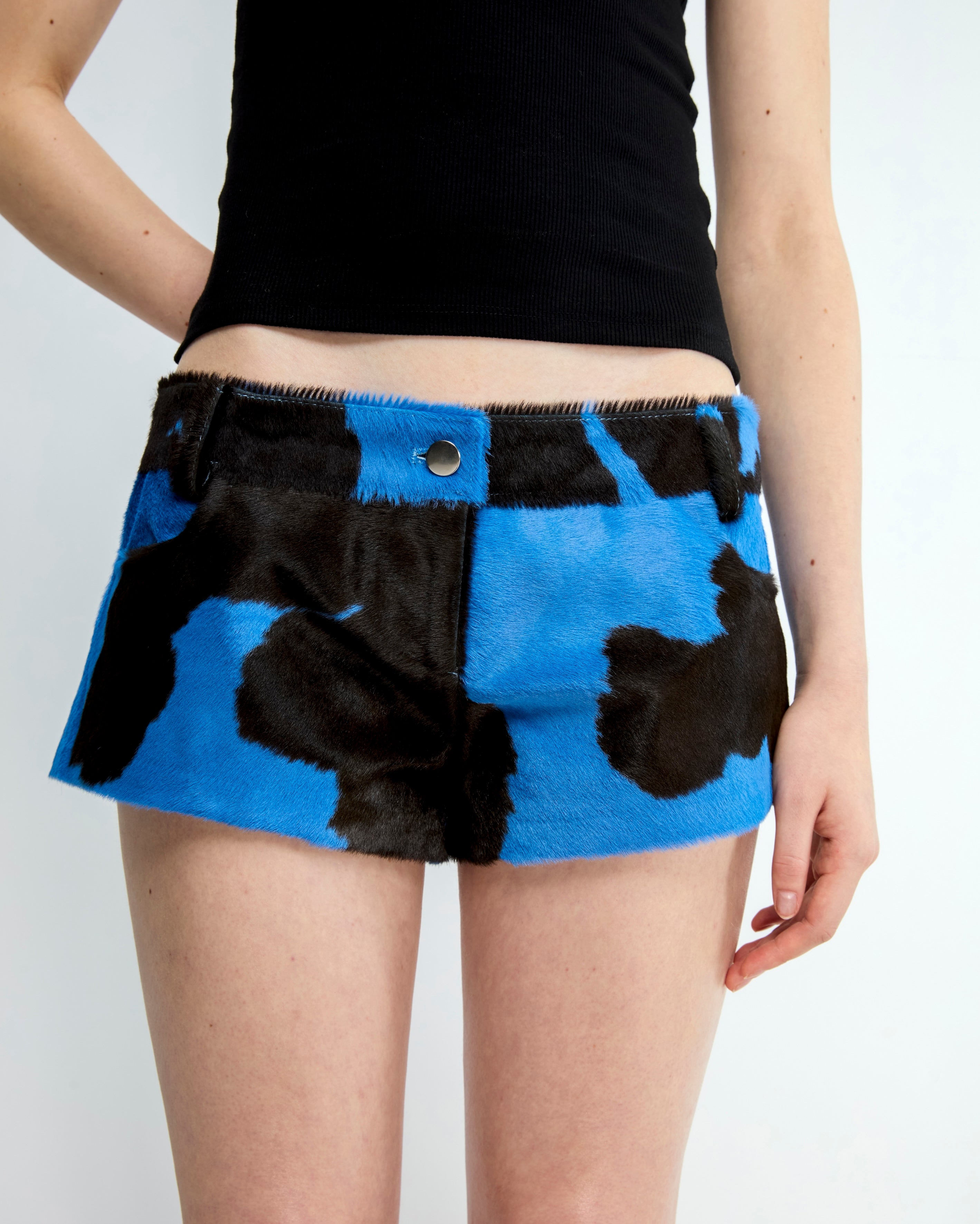 ILOA - Cow-print pony hair leather mini shorts