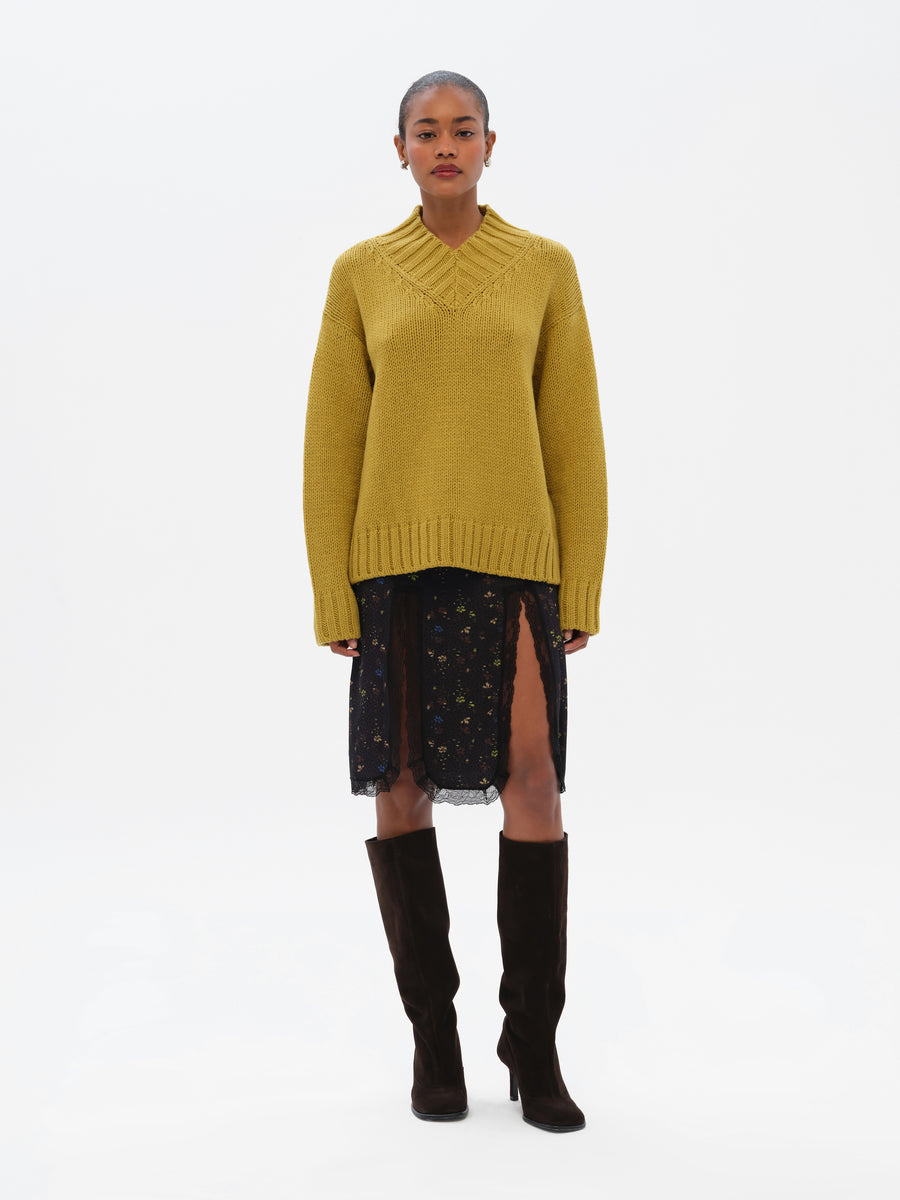 LUNIA - High v-neck chunky sweater with logo detail