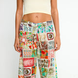 COLY - Wide-leg tie-front trousers with hem detail