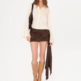 BOWLIE - Mini skirt with a side-bow detail