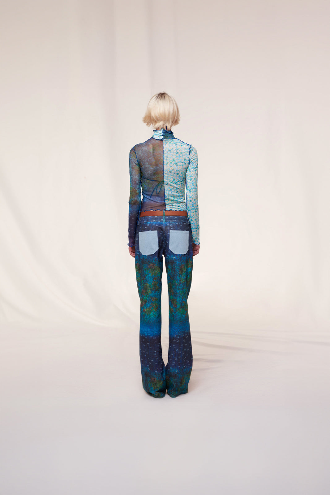 CODY - Mesh-panelled printed turtleneck top